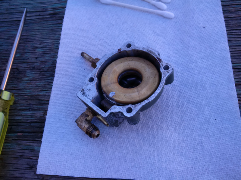 Getting the lower half of the carb back together after sitting the parts in carb cleaner for a couple days.
